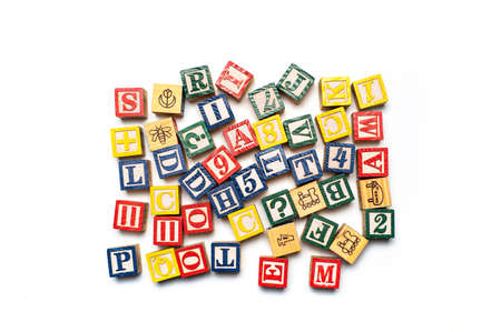 Alphabet characters written with wooden letters, education abstract background top viewの写真素材