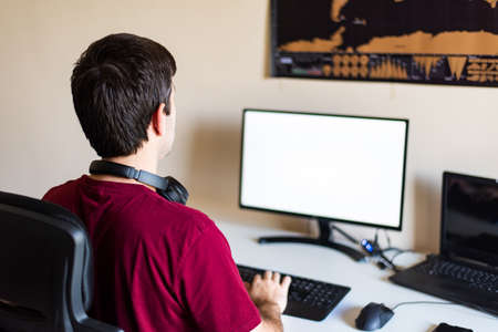 Man working from home in an improvised office in the living room