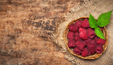 fresh raspberry red berry fruit in a bowl