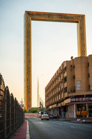 Dubai, United Arab Emirates - November 26, 2020: Old neighborhood of Al Karama with Dubai Frame rising above and framing Burj Khalifa and the modern downtown of Dubai in the UAE. Old architecture meeting newのeditorial素材