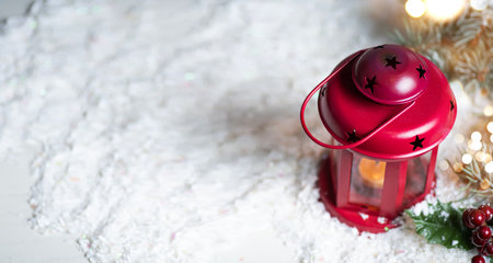 Festive candle light lantern and Christmas and New Year holidays copy space backgroundの写真素材