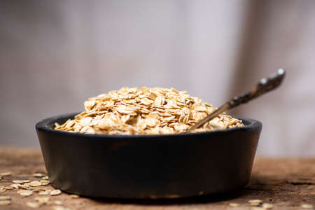 Uncooked oats breakfast cereals in a bowl