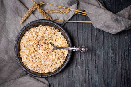 Uncooked oats breakfast cereals in a bowl