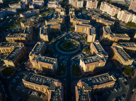 Aerial view of International City in Dubai, United Arab Emirates. Suburban country-themed...