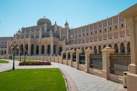Sharjah, United Arab Emirates - March 24, 2021:Sharjah Municipality main office resembling parliament building characterised by islamic architecture in Sharjah emirate downtown in the United Arab Emirates on a sunny dayのeditorial素材