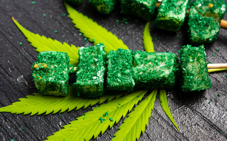 Marijuana cannabis leaves dessert snack on a stickの写真素材