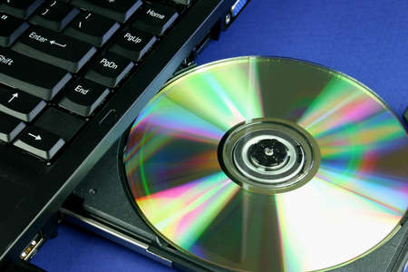 Disc in laptop CD trayの写真素材
