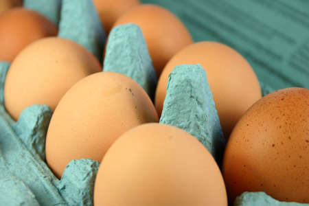 Closeup of fresh eggs in carton