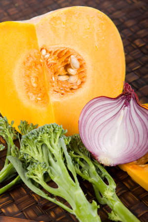 fresh vegetables - pumpkin broccoli and red onionの写真素材