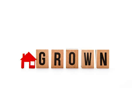 Home Grown - block letters with red home / house icon with white backgroundの写真素材