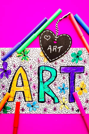 Art Jigsaw - hand drawn in colored pen on jigsaw puzzle with heart shape chalkboardの写真素材
