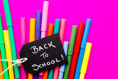 Back to School - colored pens on pink backgroundの写真素材