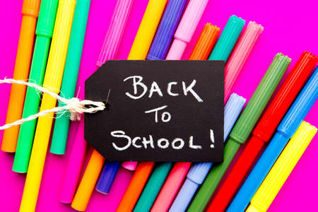 Back to School - colored pens on pink backgroundの写真素材