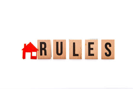 House Rules - block letters with red home / house icon with white backgroundの写真素材