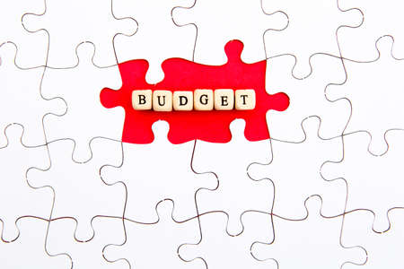 Puzzle Pieces - with word Budget in missing red spaceの写真素材