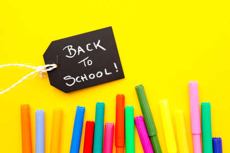Back to School - colored pens on yellow backgroundの写真素材