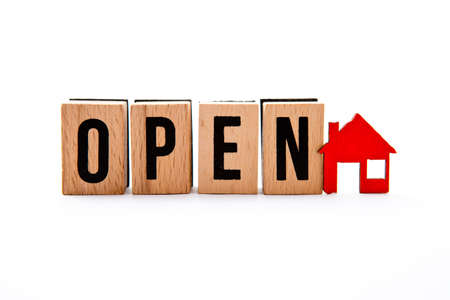 Open House - wooden block letters with red house icon - white backgroundの写真素材
