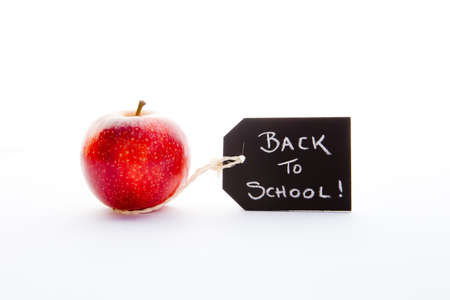 Back to School - Red Apple and blackboard with handwritten chalkの写真素材