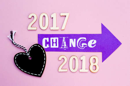 Change - 2017 to 2018 with purple arrow and heart shape blackboardの写真素材