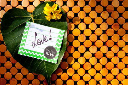 Love - To Do List on wooden mat background