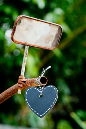 Heart Blackboard on vintage handlebars of bicycleの写真素材