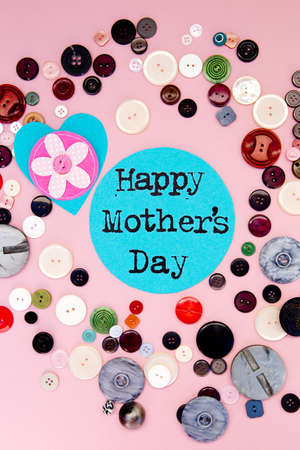 Sewing - Happy Mother's Day with buttons on pink backgroundの写真素材