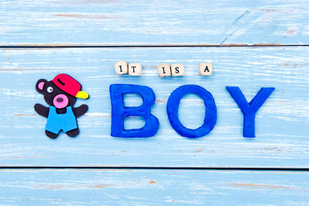 It's a Boy - on blue wooden backgroundの写真素材