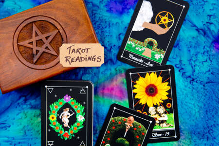 Tarot readings with deck of Tarot cards with wooden box with pentagram designの写真素材