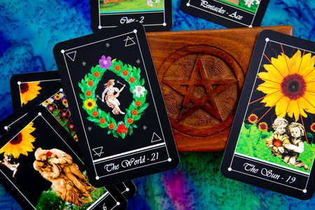 Tarot readings with deck of Tarot cards with wooden box with pentagram designの写真素材