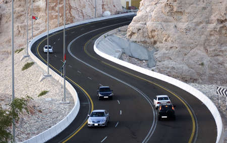 Steep mountain road in Al Ain in UAE. Home to the great hot water spring water and famous jebel hafeth mountain.の写真素材