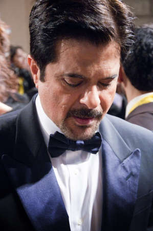 Dubai - UAE - December 2011: Anil Kapoor greets fans as he arrives at the opening ceremony for のeditorial素材