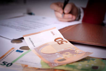 Hand with banknotes. European currency. Business and finance. Economy and banking in Europe.の写真素材