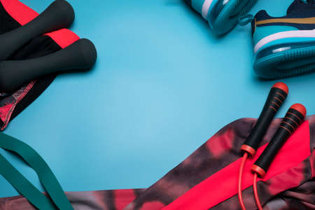 Sport background with fitness accessories. Free space for text.