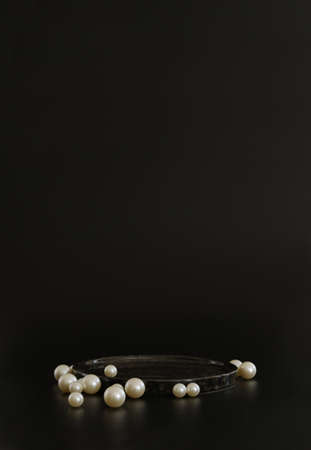 Black podium on the black background with pearls. Podium for product, cosmetic presentation....