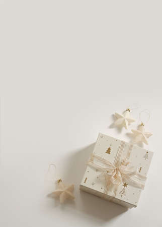 Christmas composition. Xmas background. Christmas gift and decoration elements on the dark background, fairy lights. Free space for text, copy space. Flat lay, top viewの写真素材