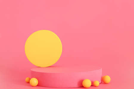 Pink and yellow podium on the pink background. Podium for product, cosmetic presentation. Creative mock up. Pedestal or platform for beauty products.の写真素材