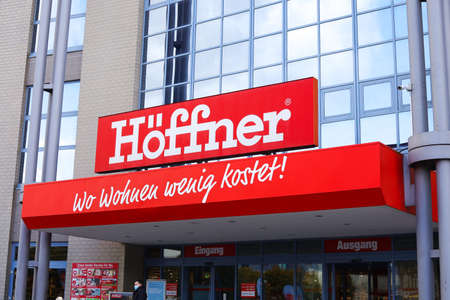 Entrance to Hoeffner store in Germany. Hoffner logo. Furniture retailer.のeditorial素材
