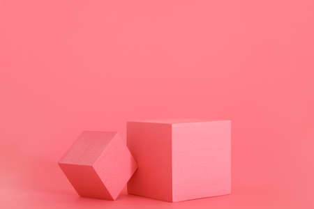 Pink podium on the pink background. Podium for product, cosmetic presentation. Creative mock up. Pedestal or platform for beauty products.の写真素材