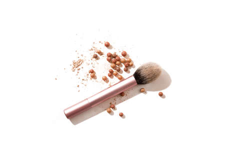 Face powder and powder balls with makeup brush, isolated on the white background. Copy space.の写真素材