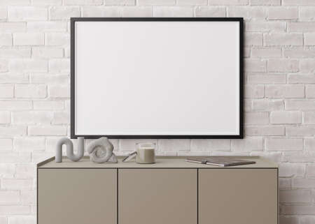Empty horizontal picture frame on white brick wall in modern living room. Mock up interior in...