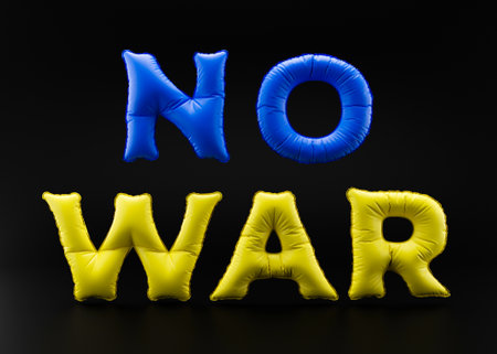 Text NO WAR in colors of Ukrainian flag, blue and yellow, on black background. Russian Ukrainian...