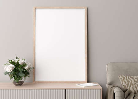 Empty vertical picture frame on cream wall in modern living room. Mock up interior in minimalist,...