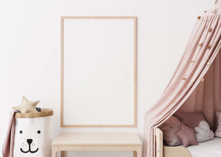 Empty vertical picture frame on white wall in modern child room. Mock up interior in scandinavian style. Free, copy space for your picture. Close up view. Cozy room for kids. 3D rendering.の写真素材