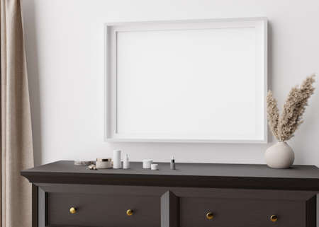 Empty picture frame on white wall in modern bedroom. Mock up interior in contemporary style. Close...