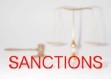 Text SANCTIONS on white background. Economic, financial, political sanctions. Russian oil and gas embargo. Russian Ukrainian conflict. Stop war, occupation. 3D rendering.の写真素材