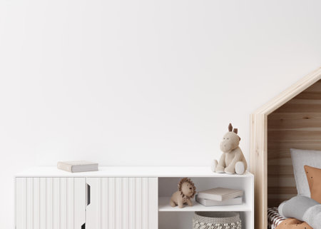 Empty white wall in modern child room. Mock up interior in scandinavian style. Copy space for your picture or poster. Bed, sideboard, toys. Cozy room for kids. 3D rendering.の写真素材