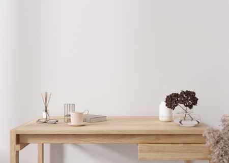 Empty white wall. Mock up interior in contemporary style. Close up view. Copy space for your picture, poster, text, or another design. Desk, vase with dried plants, other home accessories. 3D render.の写真素材