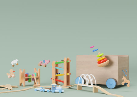 Children's toys on green background with copy space. Multicolored wooden toys for toddler or baby....