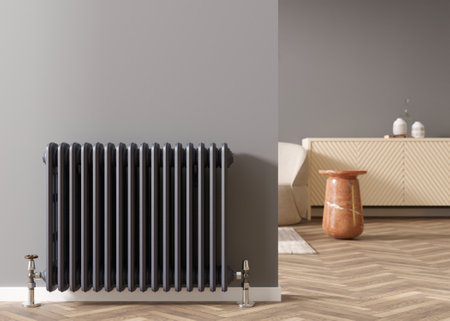 Heating radiator on gray wall in modern room. Home interior. Central heating system. Heating is getting more expensive. Energy crisis. 3D rendering.の写真素材