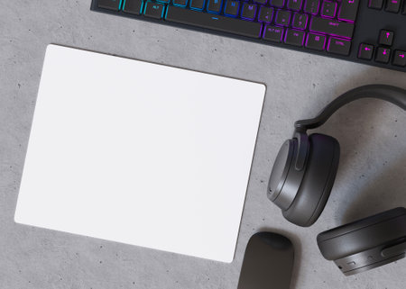 Blank and white computer mouse pad on the desk at home. Mousepad mockup. Copy space for your picture or text. Empty mouse mat ready for your design. Mock up, template. 3D render.の写真素材